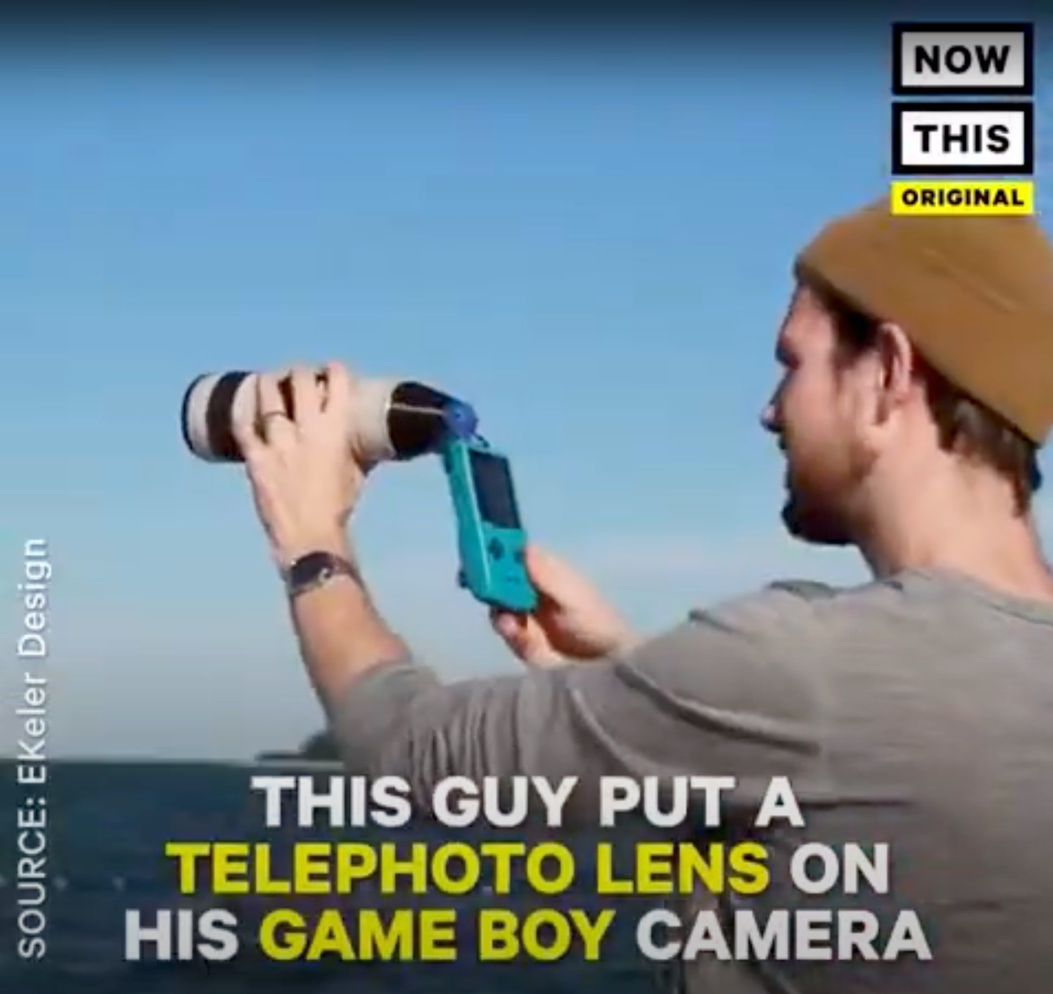Bastiaan holding a Game Boy Camera fitted with a Canon telephoto lens